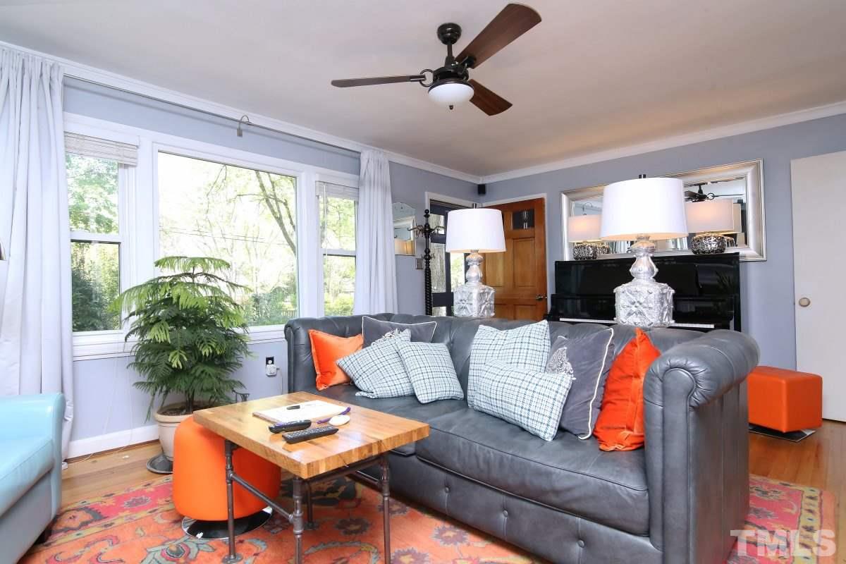 1106 Southerlund Road Garner, NC 27529 - Photo 3 of 24 a living room with furniture and a couch