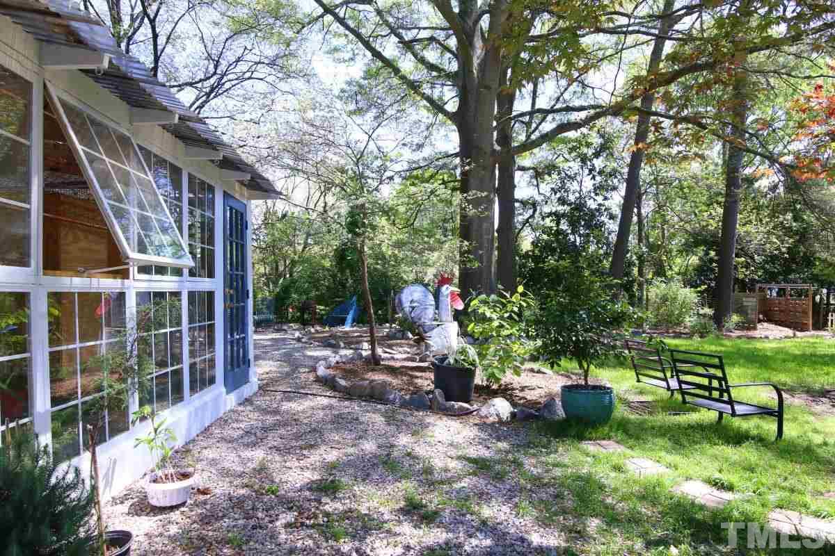 1106 Southerlund Road Garner, NC 27529 - Photo 22 of 24 a backyard of a house with seating space