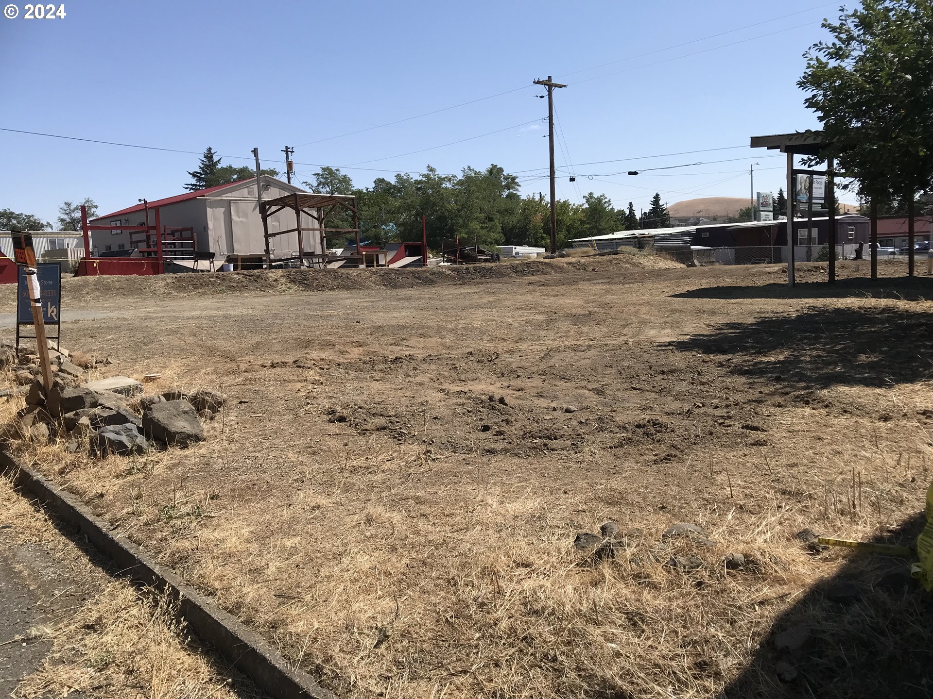 610 Northeast 2nd Street Goldendale, WA 98620 - Photo 3 of 13 a view of a road with an ocean view