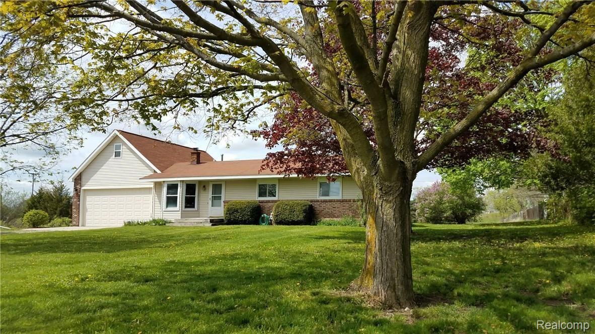 4614 Emmons Road Howell, MI 48855 - Photo 2 of 19 Goodrich Front Yard.jpg