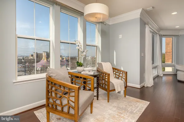 a kitchen with sink and refrigerator