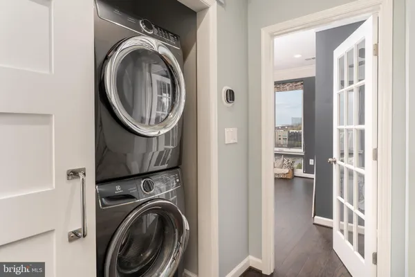 a living room with fireplace furniture and a wooden floor