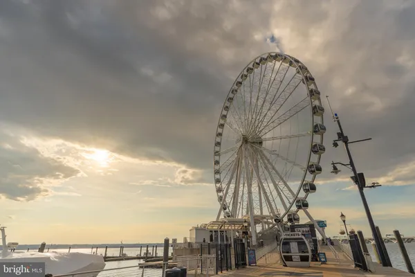 a picture of a building with sitting area