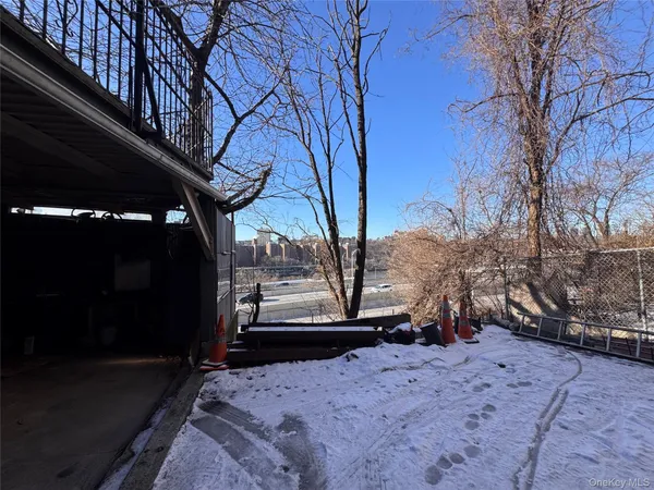 a view of a backyard of the house