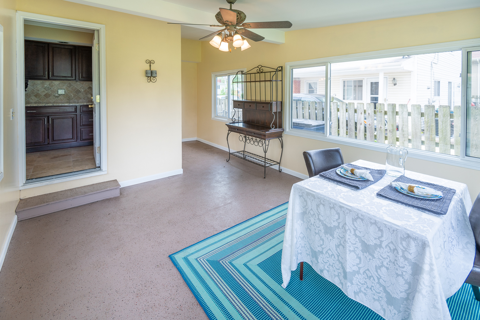 227 Country Club Drive Addison, IL 60101 - Photo 17 of 39 a living room with furniture and a floor to ceiling window