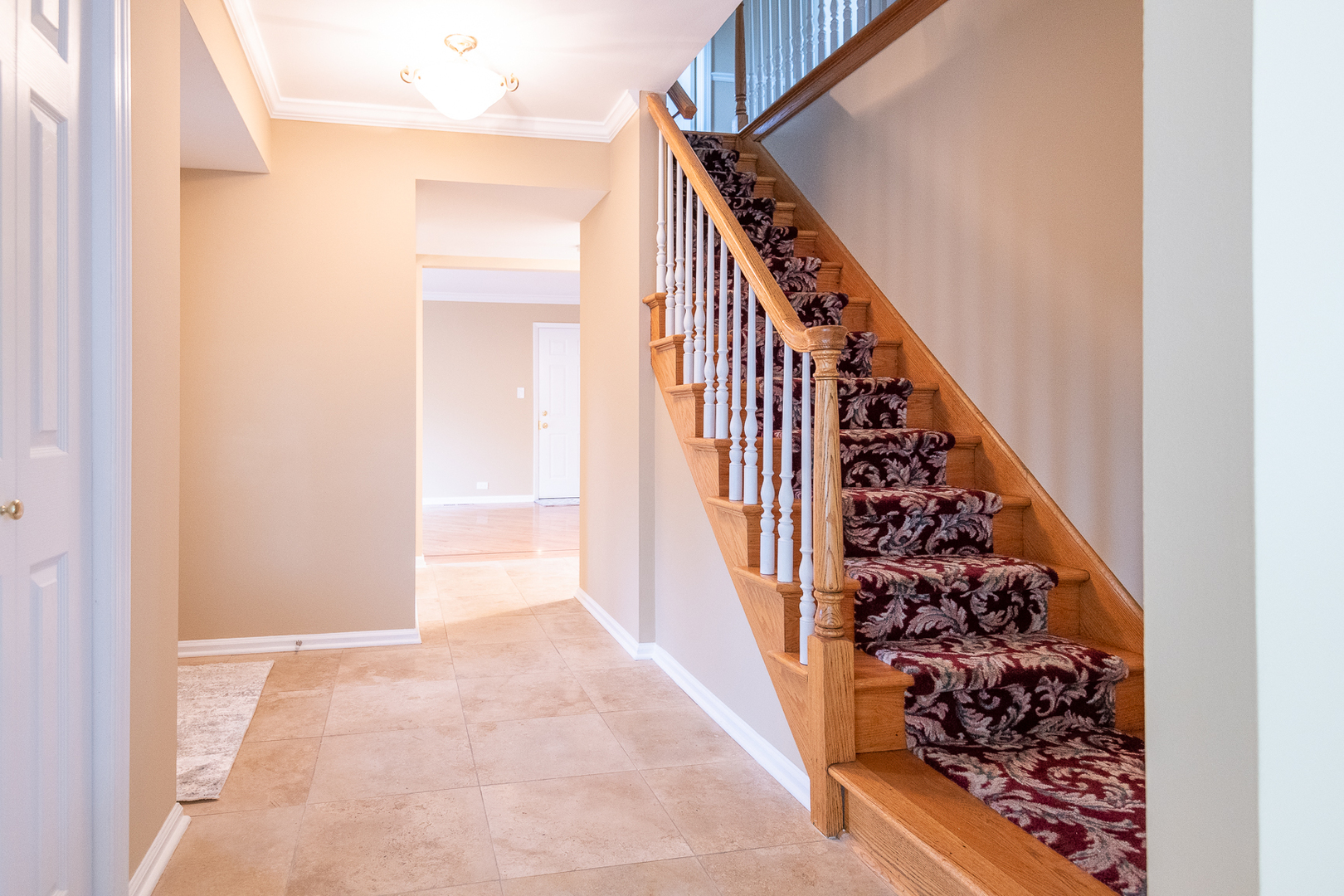 227 Country Club Drive Addison, IL 60101 - Photo 3 of 39 a view of entryway with wooden floor