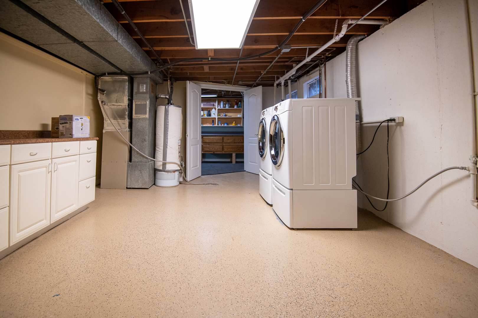 227 Country Club Drive Addison, IL 60101 - Photo 33 of 39 a view of a storage & utility room with washer and dryer