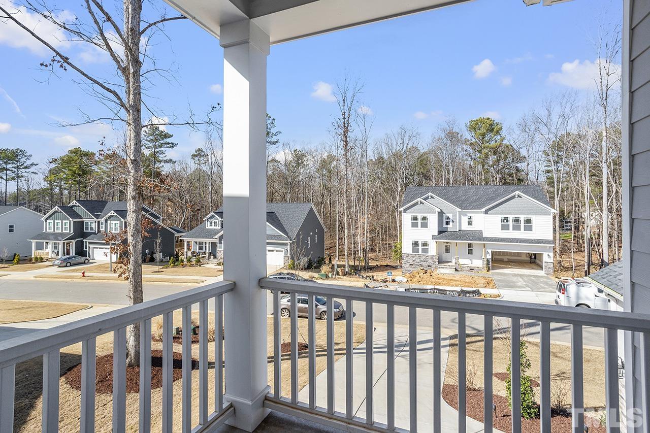 1445 Commons Ford Place Apex, NC 27539 - Photo 22 of 34 a view of a city from a balcony