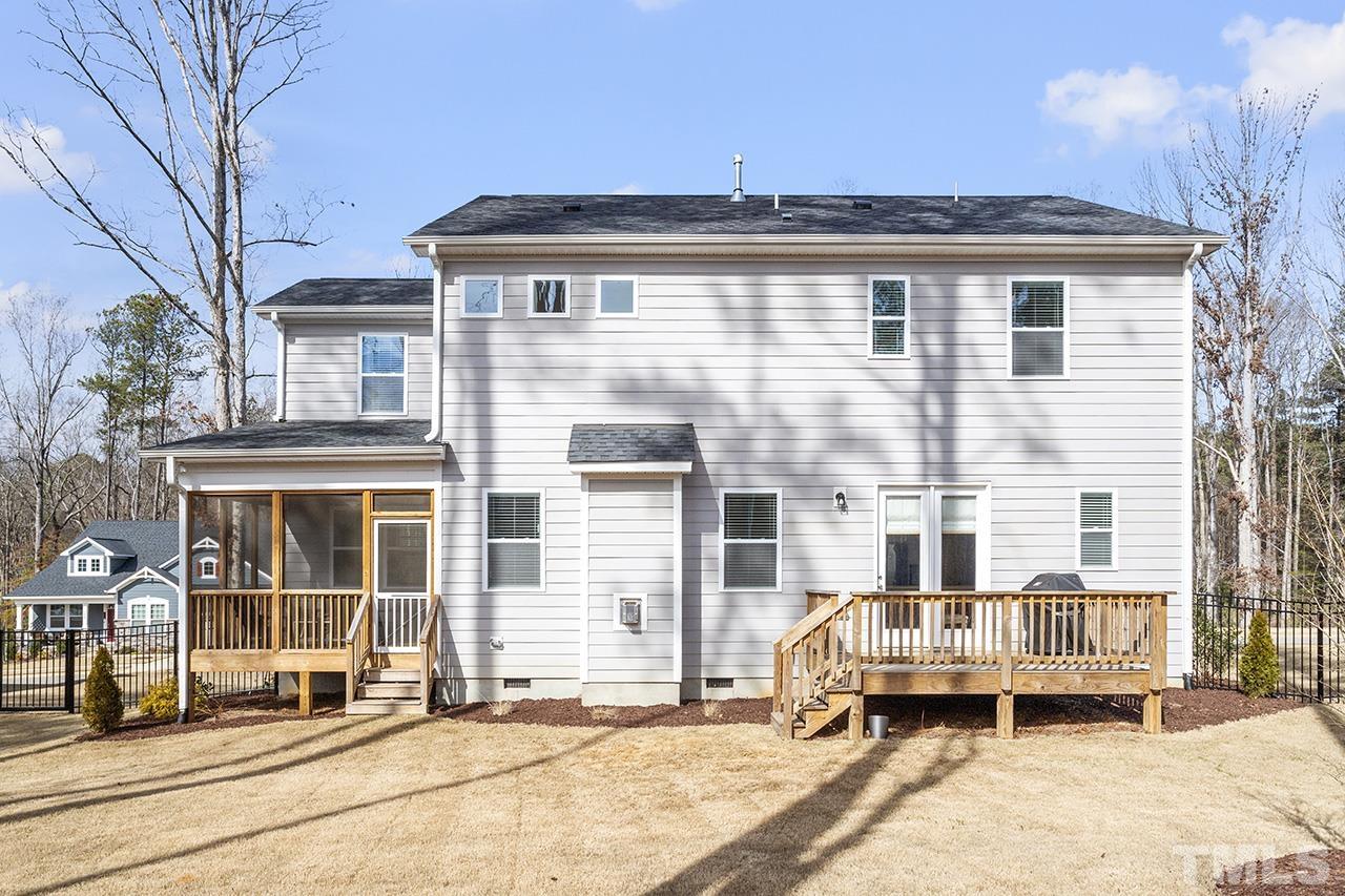 1445 Commons Ford Place Apex, NC 27539 - Photo 32 of 34 a view of street with large building