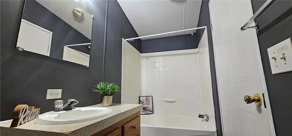 a bathroom with a toilet and a sink