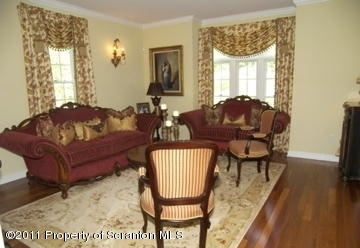 875 Sheffield Road Shavertown, PA 18708 - Photo 4 of 17 a living room with furniture and a wooden floor