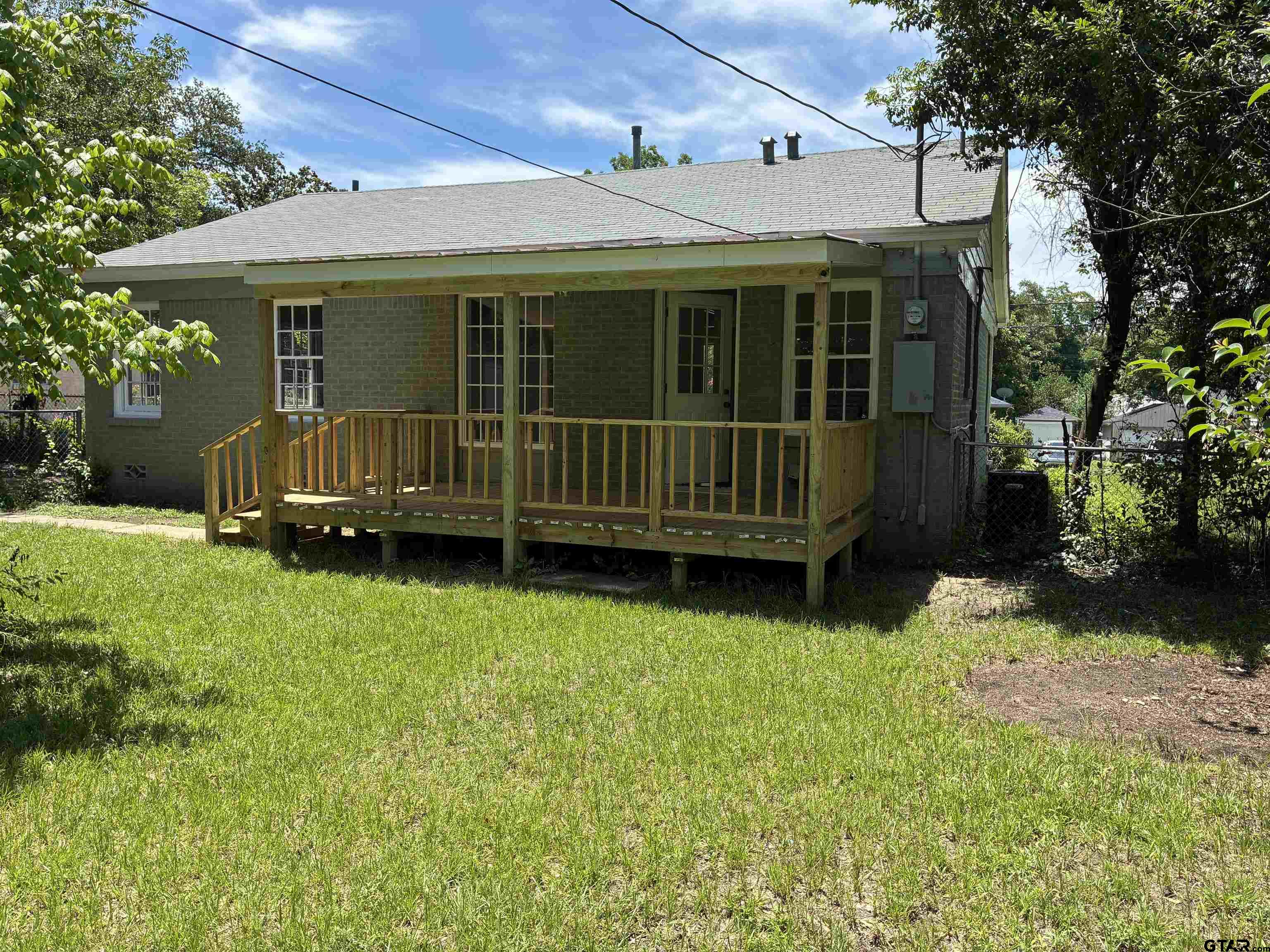 811 West 5th Street Tyler, TX 75701 - Photo 17 of 26 a view of a house with a yard