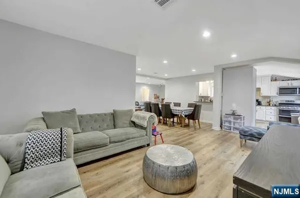 a living room with furniture and a table
