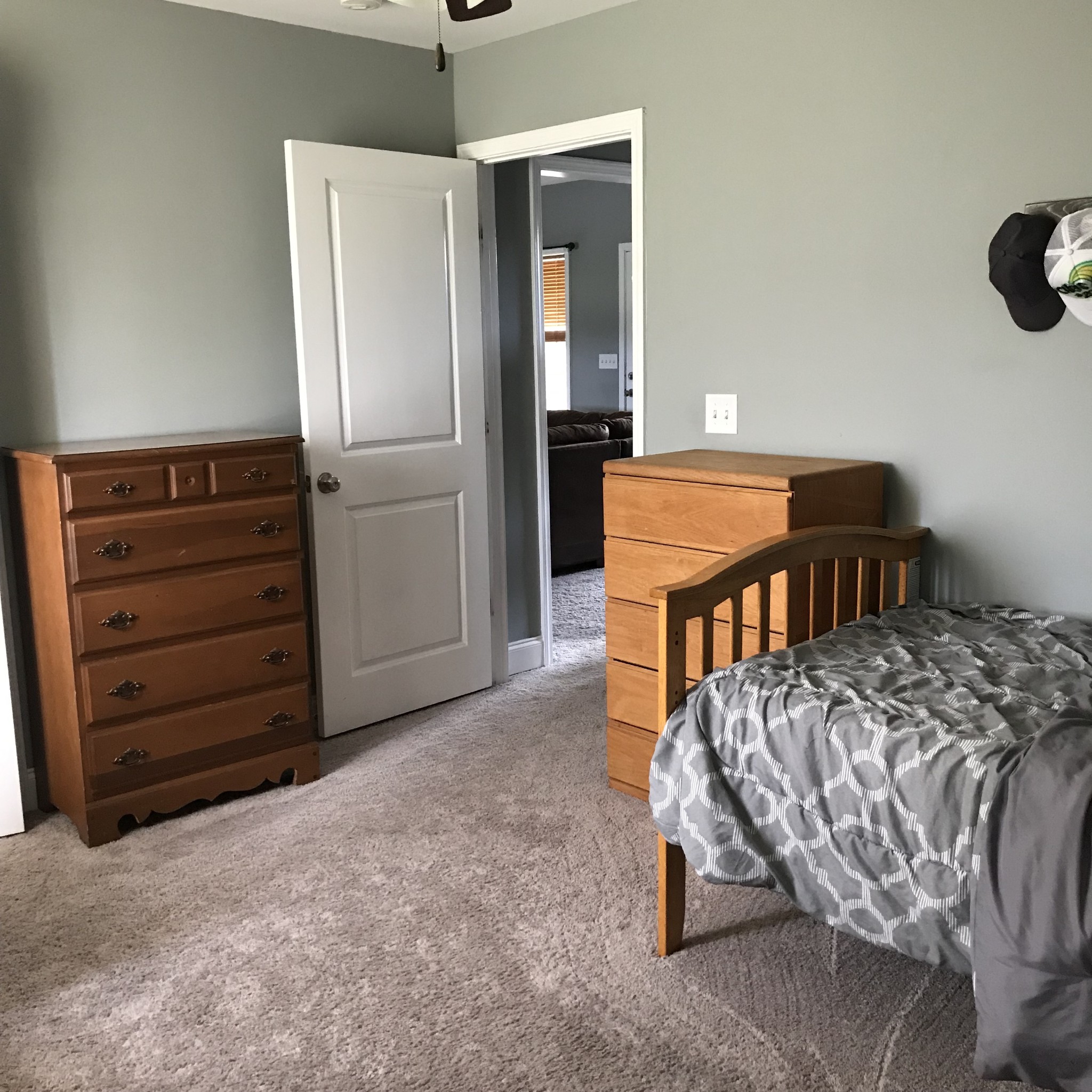 347 Freeland Road Portland, TN 37148 - Photo 8 of 13 a bedroom with a bed and a refrigerator