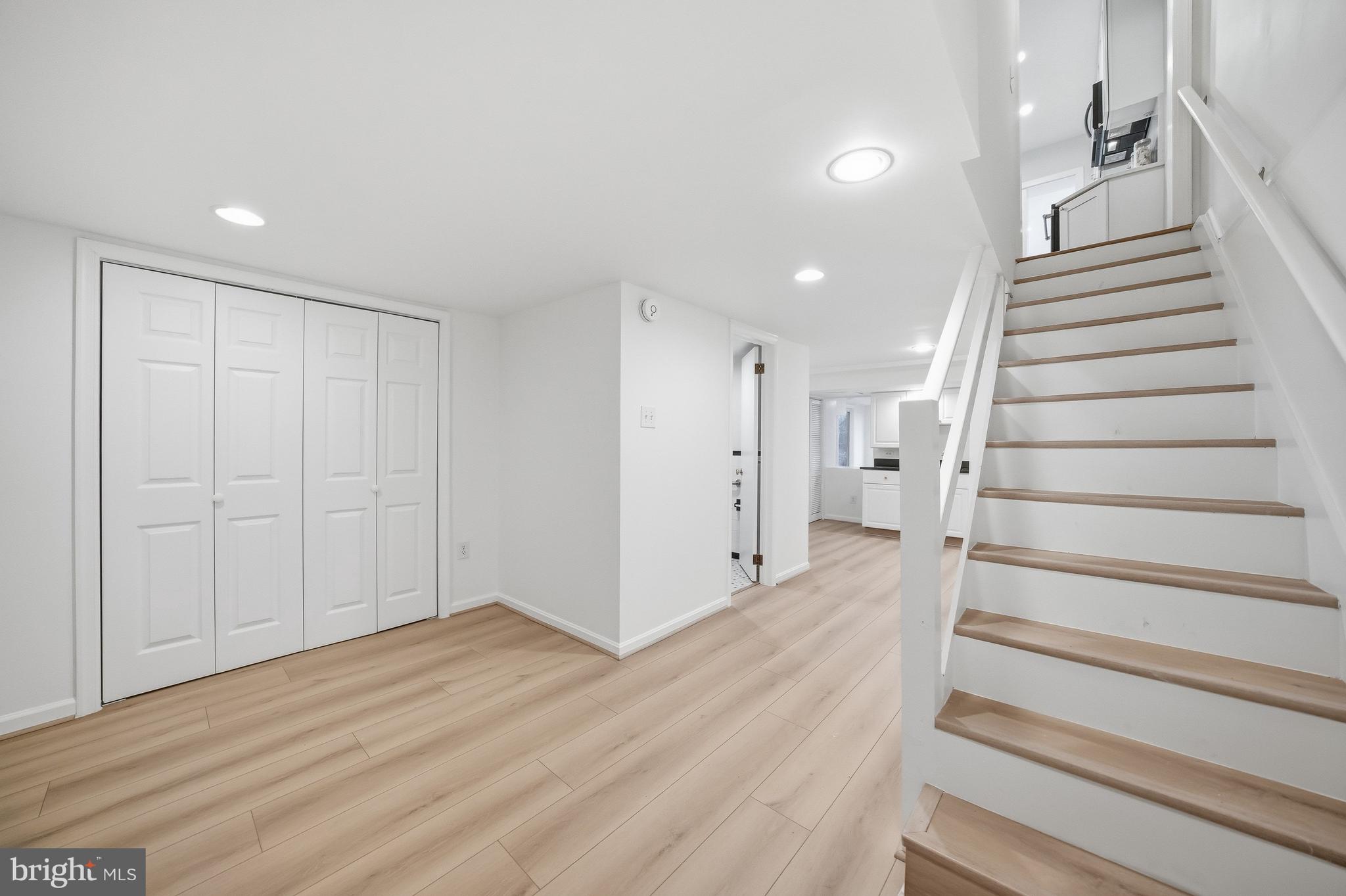 1951 39th Street Northwest Washington, DC 20007 - Photo 19 of 33 Lower level with new flooring