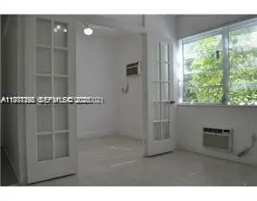 a view of a server room with racks on the wall