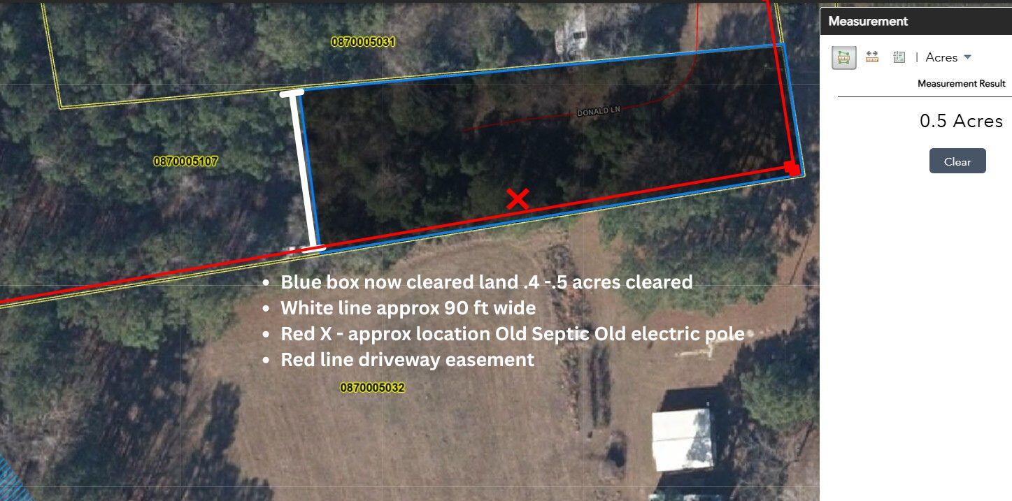 149 Donald Lane Bonneau, SC 29431 - Photo 7 of 11 blue outline land now cleared