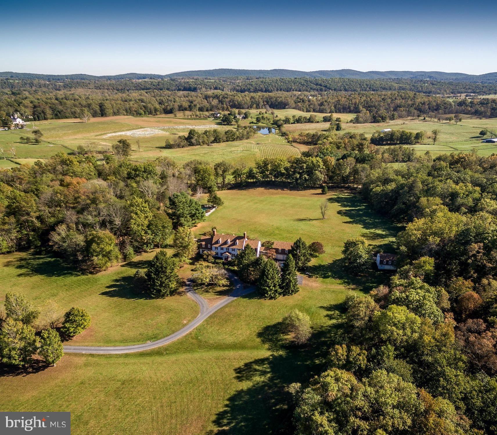 23355 Parsons Road Middleburg, VA 20117 - Photo 2 of 30 View of the farm with mountains in the background