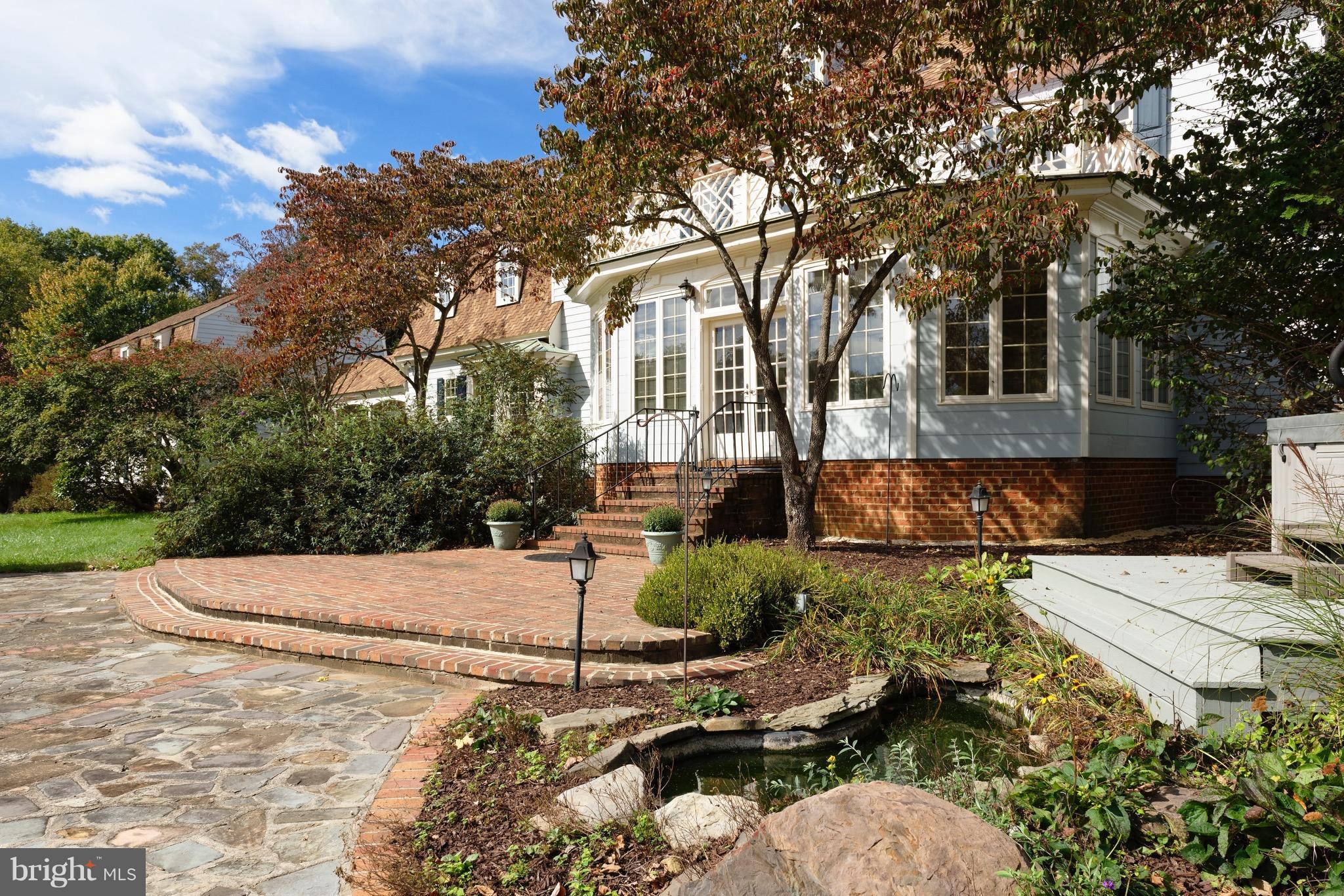 23355 Parsons Road Middleburg, VA 20117 - Photo 23 of 30 Sunroom opens to the brick & flagstone patio