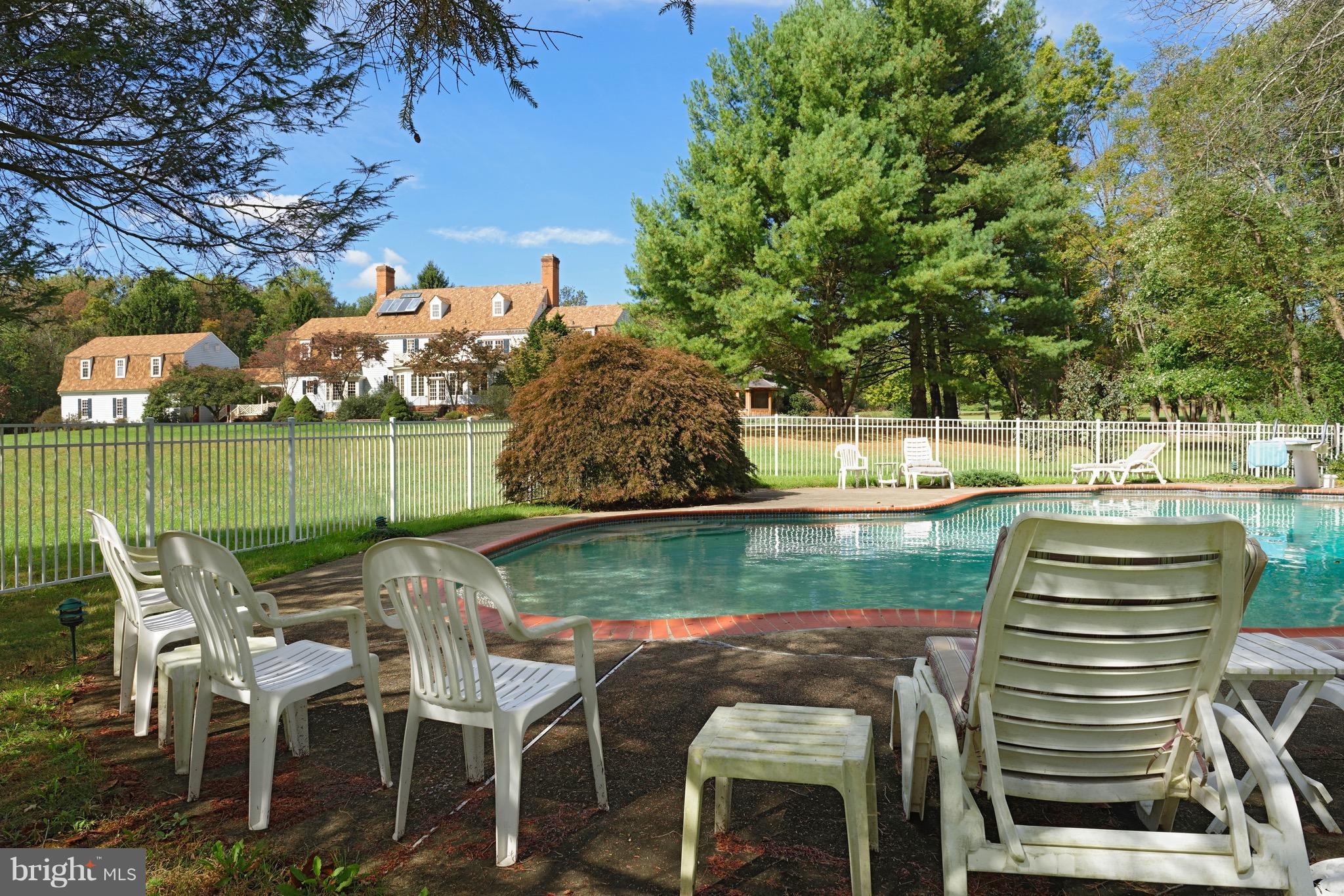 23355 Parsons Road Middleburg, VA 20117 - Photo 29 of 30 View from pool up towards the back of the house