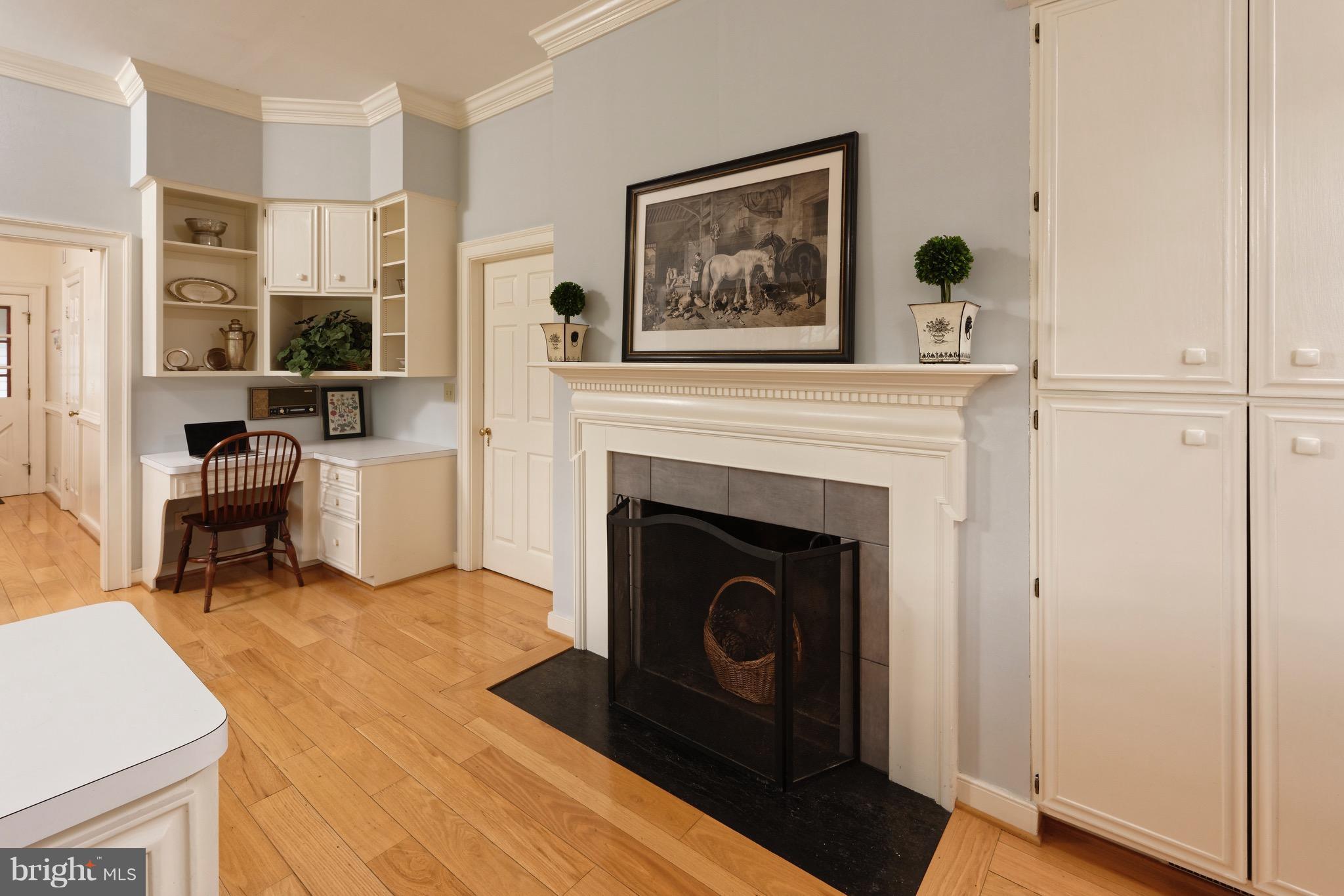 23355 Parsons Road Middleburg, VA 20117 - Photo 10 of 30 Woodburning fireplace & desk area in Kitchen