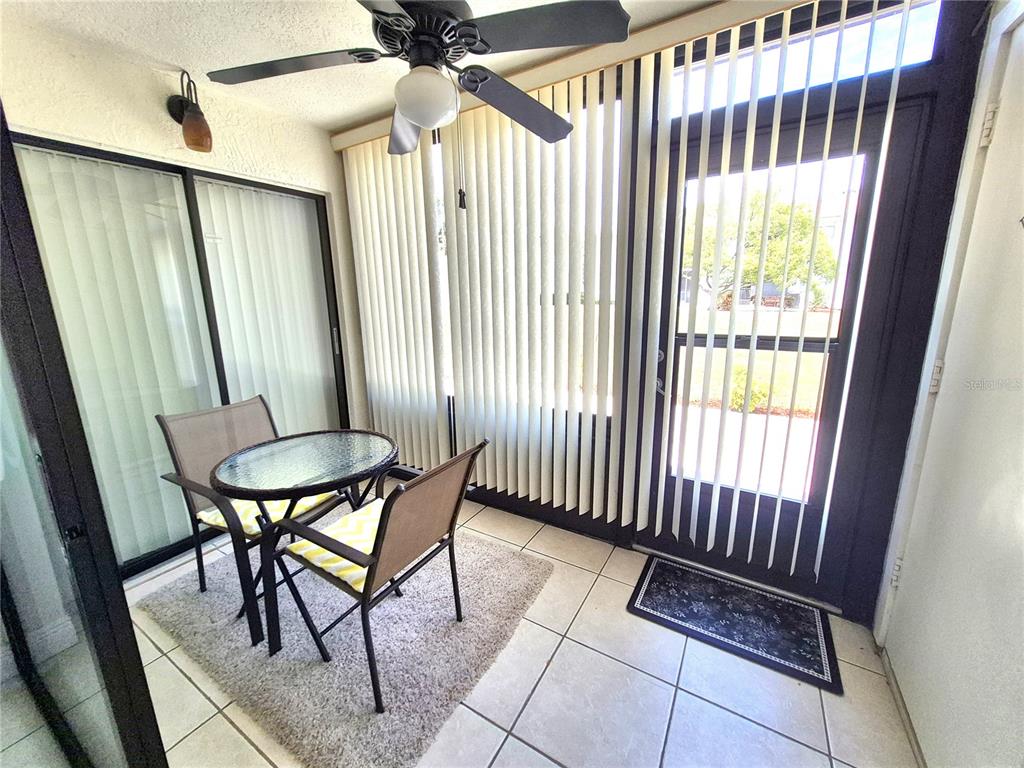 107 Windward Place, Unit 107 Oldsmar, FL 34677 - Photo 32 of 34 a view of a room with furniture and a window