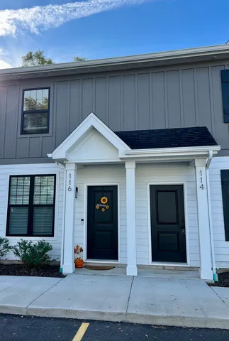 a house view with a outdoor space
