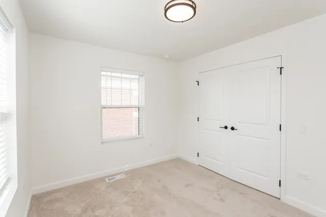 a view of a window in an empty room