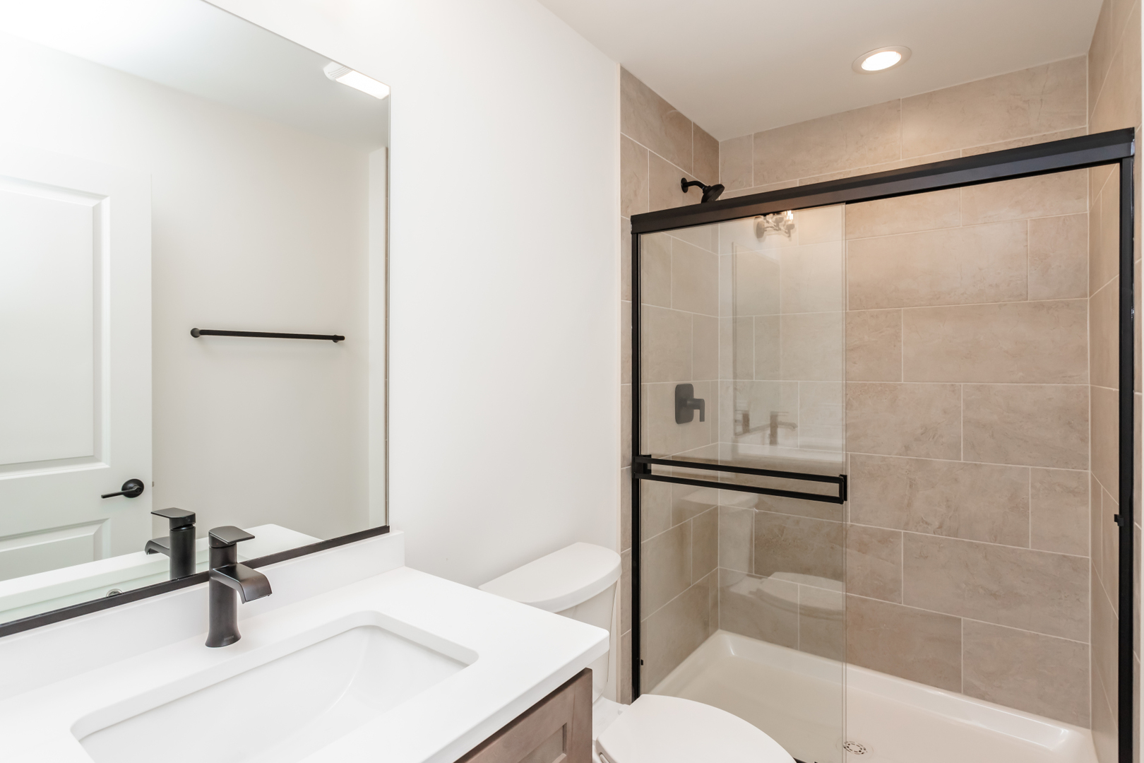 1432 North Naperville Wheaton Road, Unit 114 Naperville, IL 60563 - Photo 9 of 15 a bathroom with a shower and toilet
