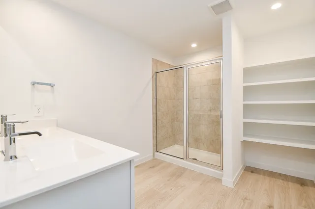 a view of a room with racks on the wall