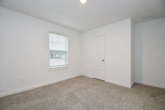 an empty room with closet