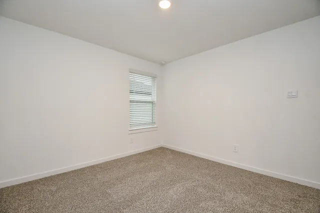 a bathroom with a toilet a sink and a bathtub
