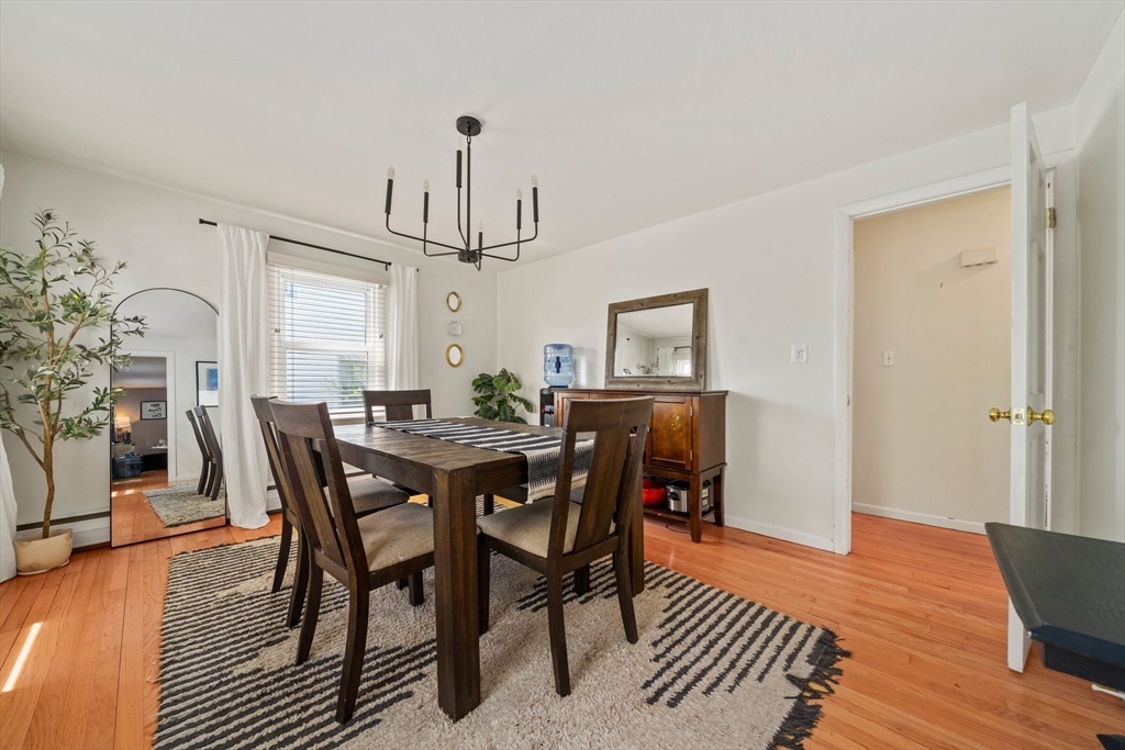 55 Running Brook Road Boston, MA 02132 - Photo 11 of 32 a view of a dining room with furniture