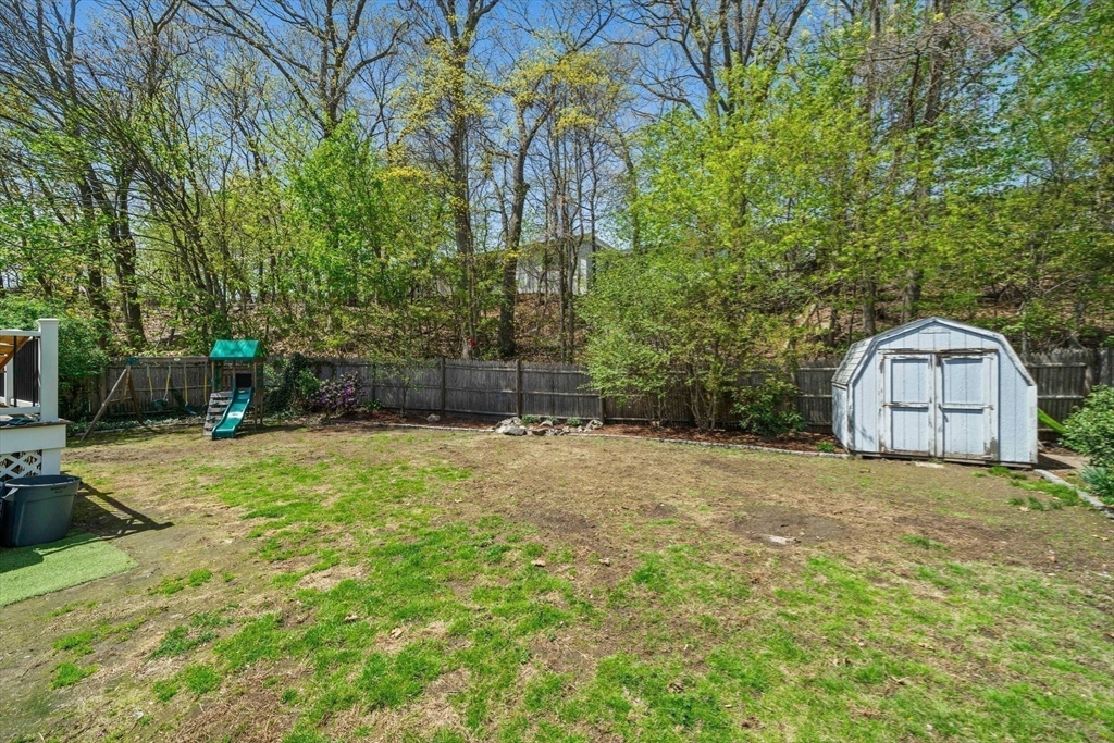 55 Running Brook Road Boston, MA 02132 - Photo 27 of 32 a house with trees in the background