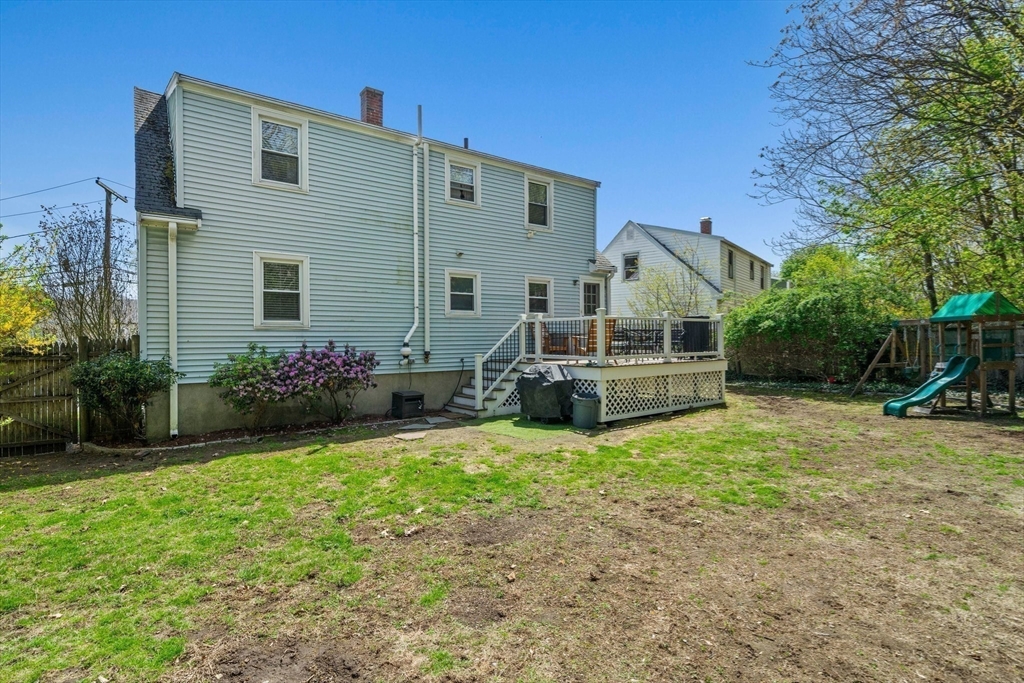 55 Running Brook Road Boston, MA 02132 - Photo 28 of 32 a front view of a house with a yard
