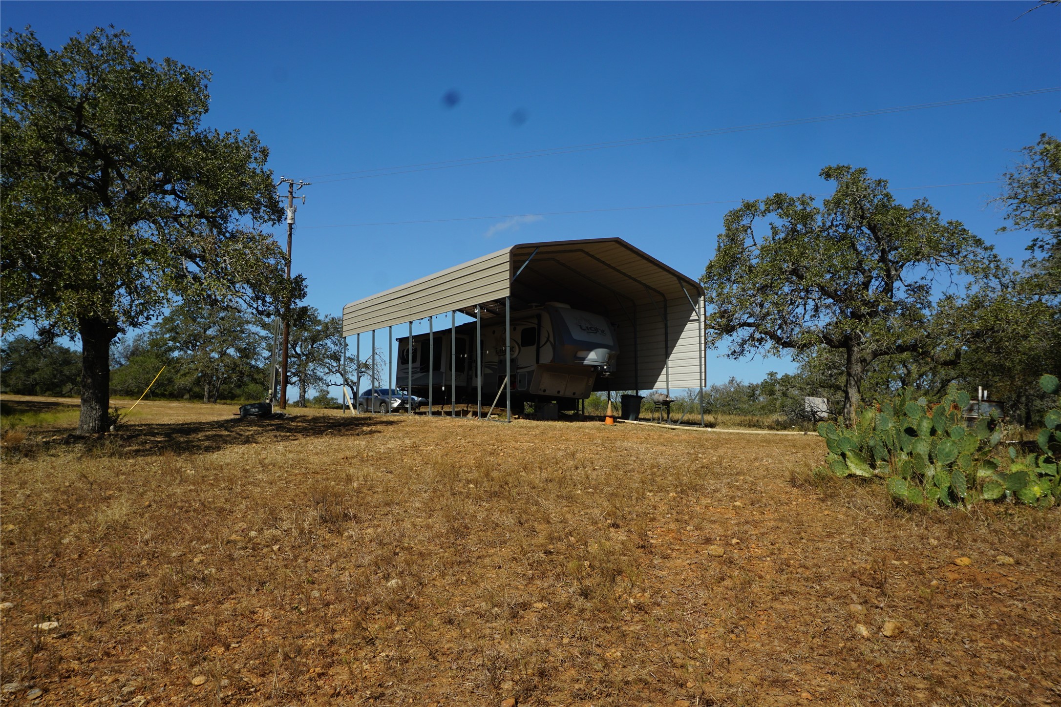 0 Old Seguin Luling Road Kingsbury, TX 78638 - Photo 2 of 27 a front view of a house with a yard