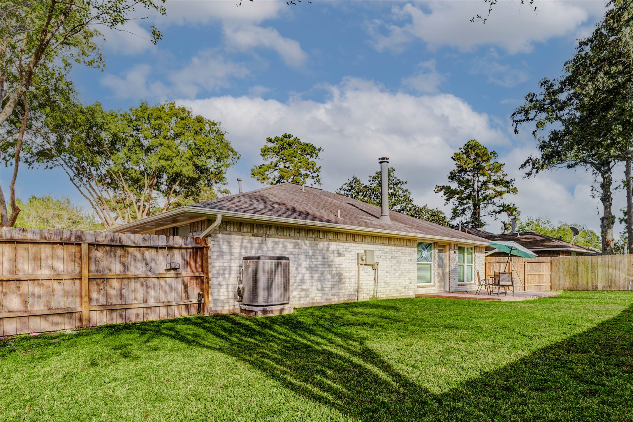2410 Clear Ridge Drive Houston, TX 77339 - Photo 13 of 24 a view of a house with backyard and garden