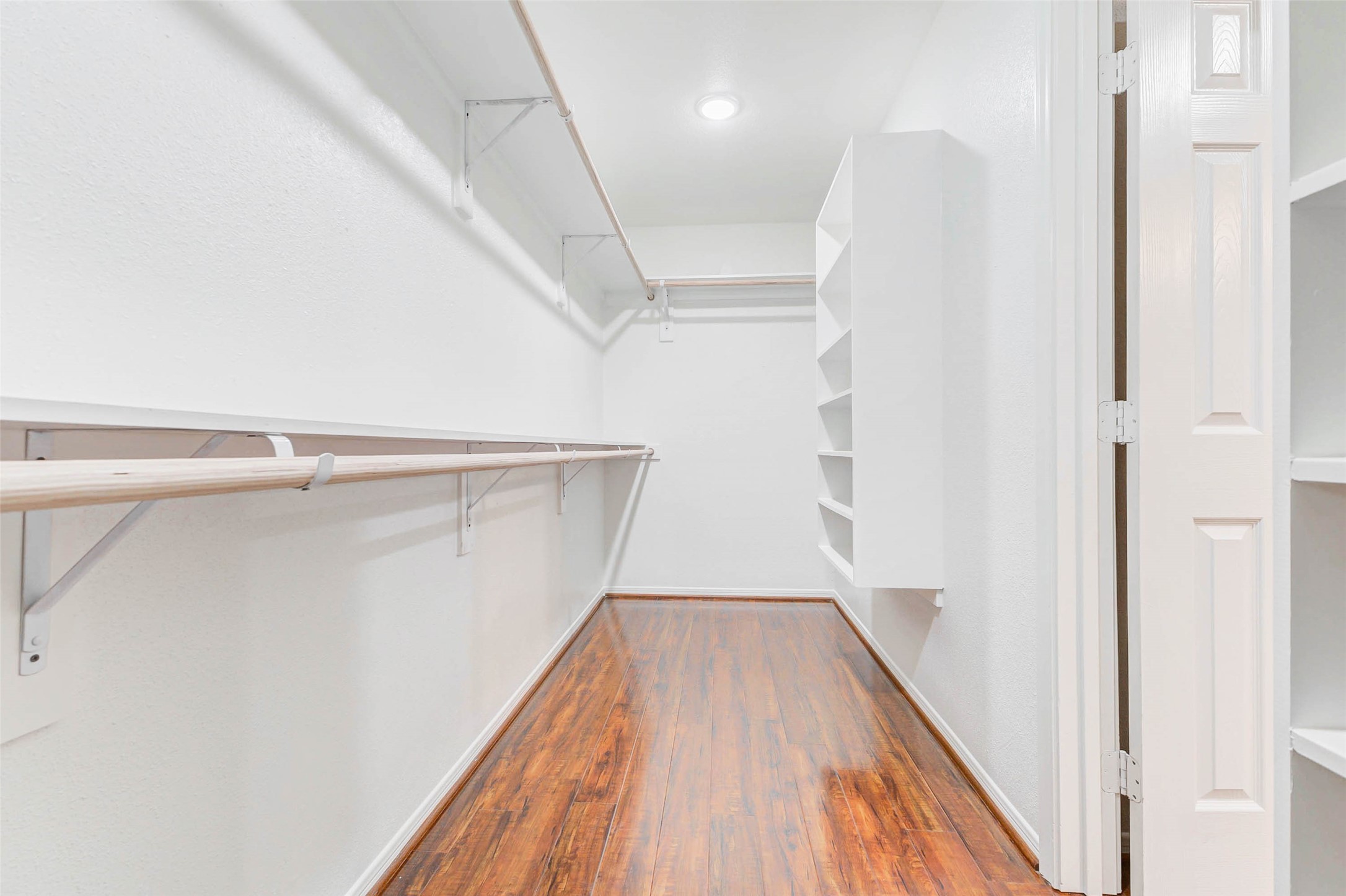 2410 Clear Ridge Drive Houston, TX 77339 - Photo 16 of 24 a view of closet with wooden floor