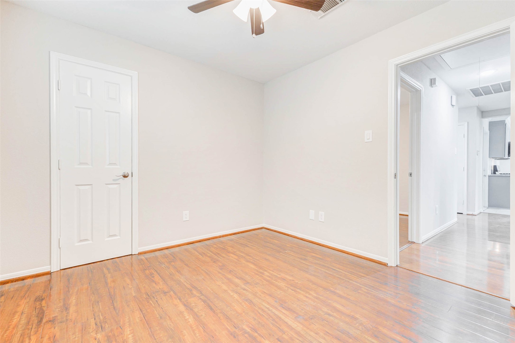 2410 Clear Ridge Drive Houston, TX 77339 - Photo 22 of 24 an empty room with wooden floor cabinet and closet