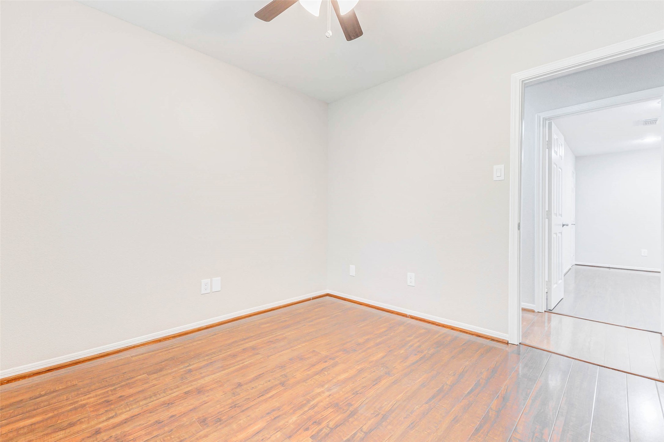 2410 Clear Ridge Drive Houston, TX 77339 - Photo 23 of 24 a view of empty room with wooden floor