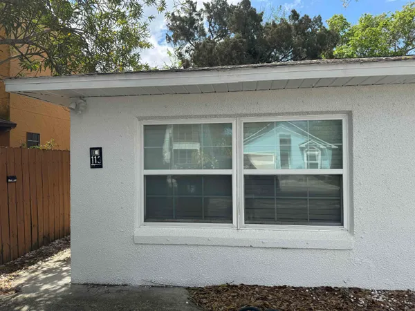 a view of entrance gate of a house