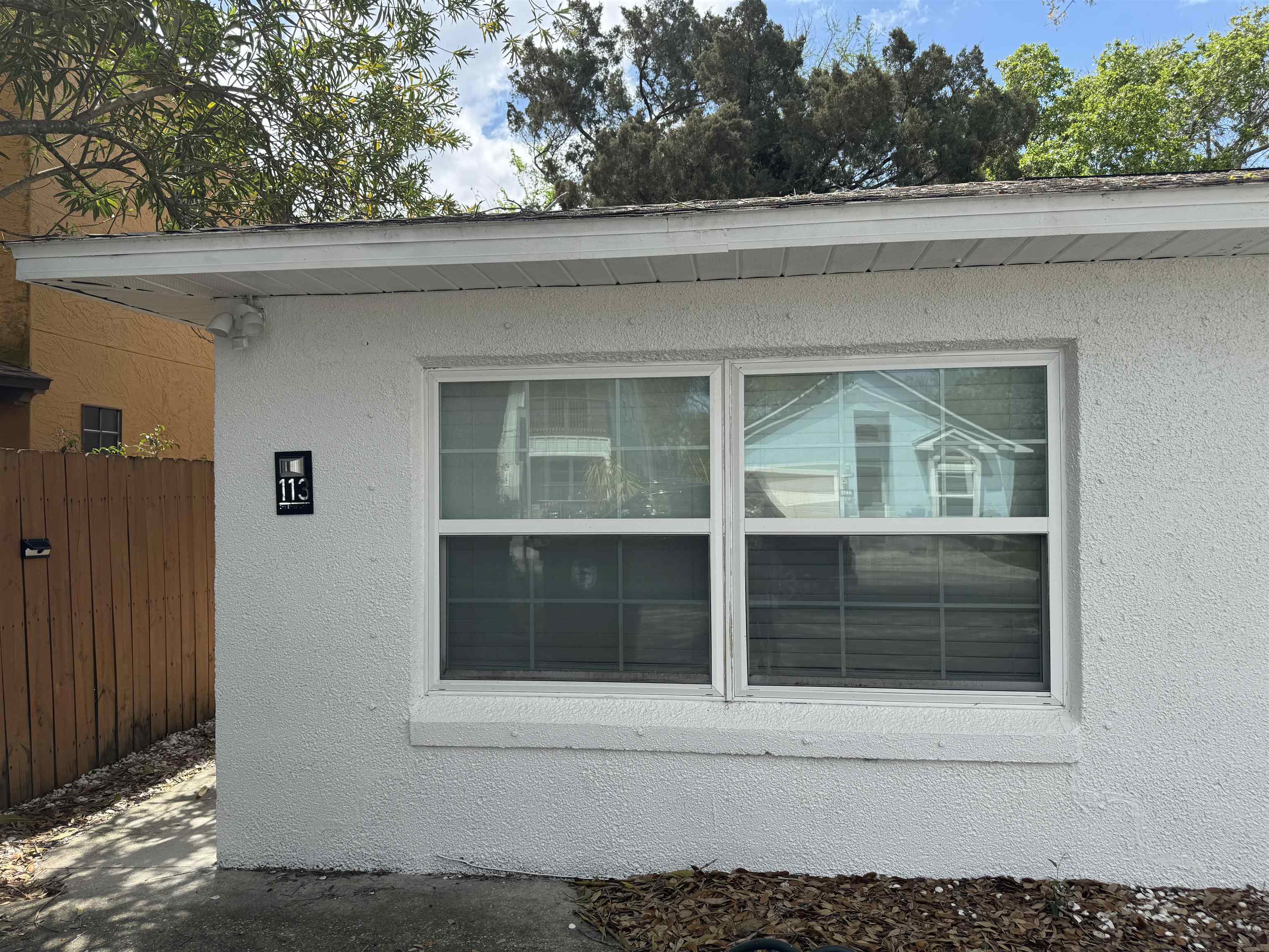 113 2nd Street, Unit A St. Augustine, FL 32080 - Photo 3 of 10 a view of entrance gate of a house