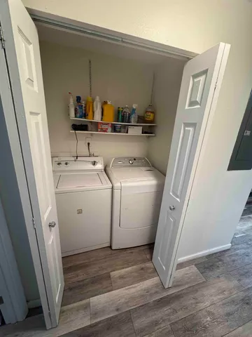 a utility room with dryer and washer