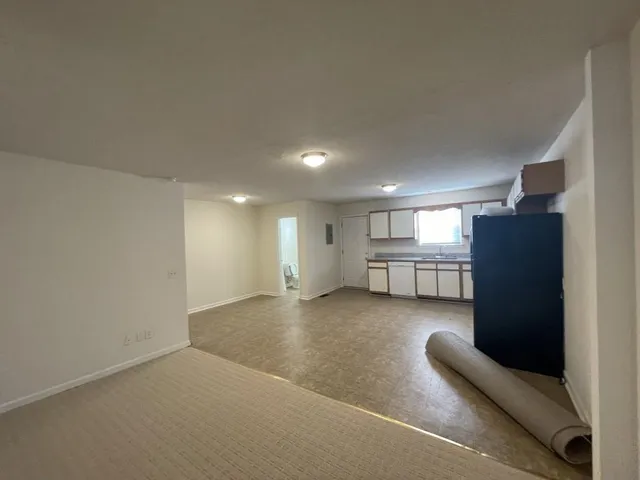 a view of a livingroom with furniture