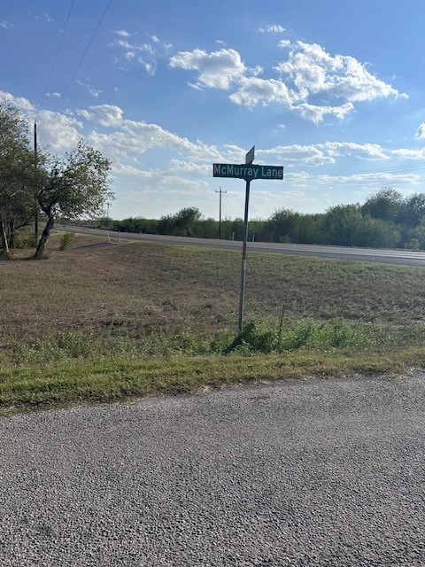 5452 Fm 666 Street Mathis, TX 78368 - Photo 17 of 17 a view of a lake with a big yard