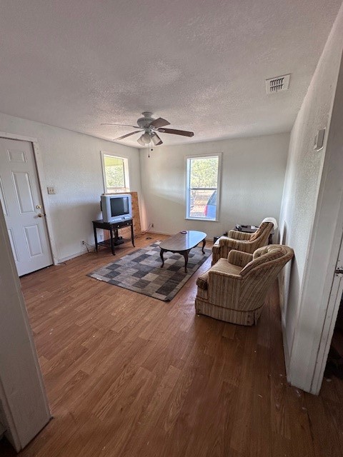 5452 Fm 666 Street Mathis, TX 78368 - Photo 6 of 17 a living room with furniture and a wooden floor
