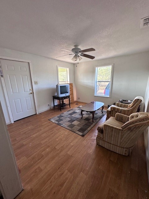 5452 Fm 666 Street Mathis, TX 78368 - Photo 7 of 17 a living room with furniture window and wooden floor