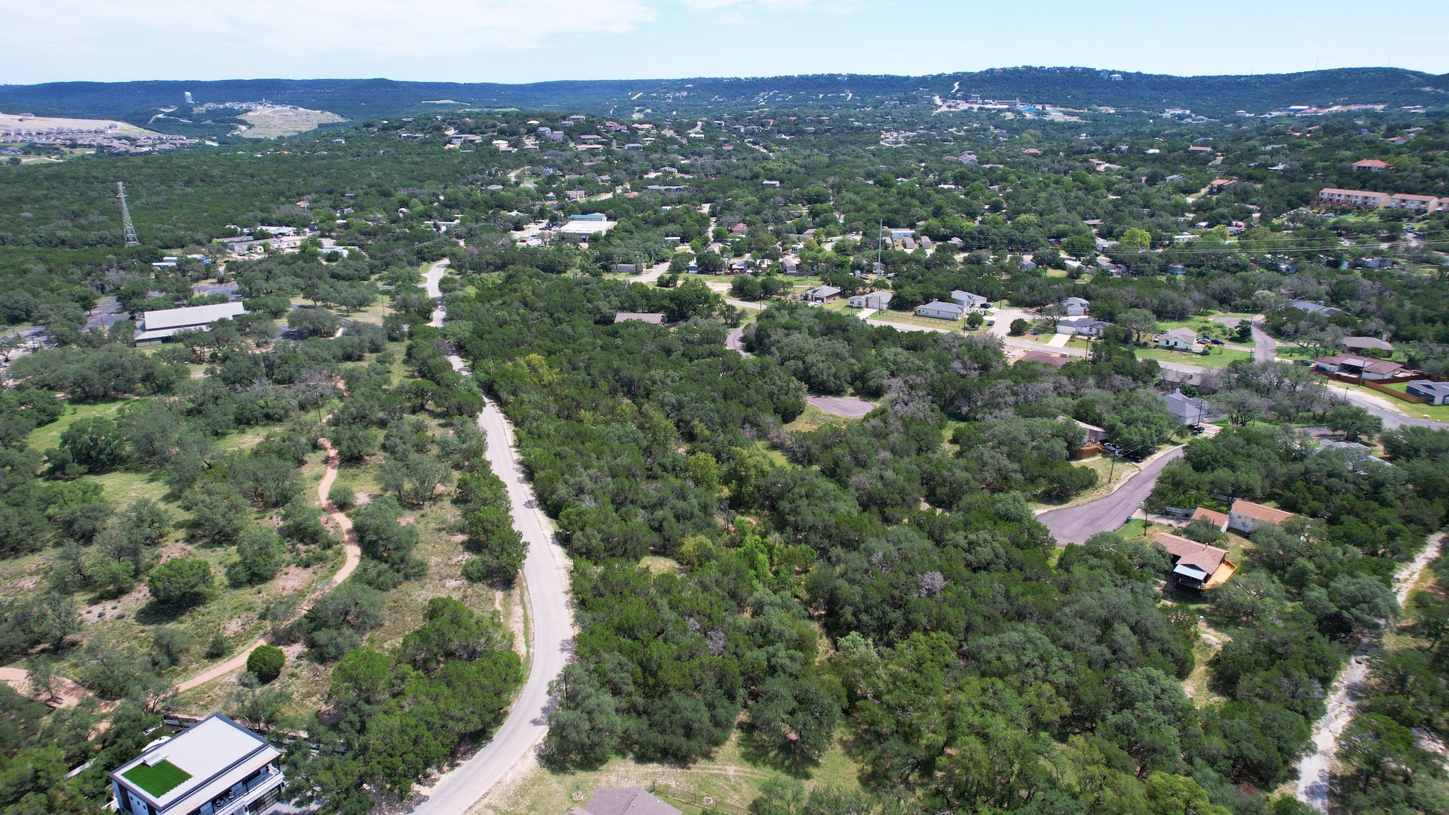 6719 Bar K Ranch Road Lago Vista, TX 78645 - Photo 14 of 36 an aerial view of residential houses with outdoor space and trees