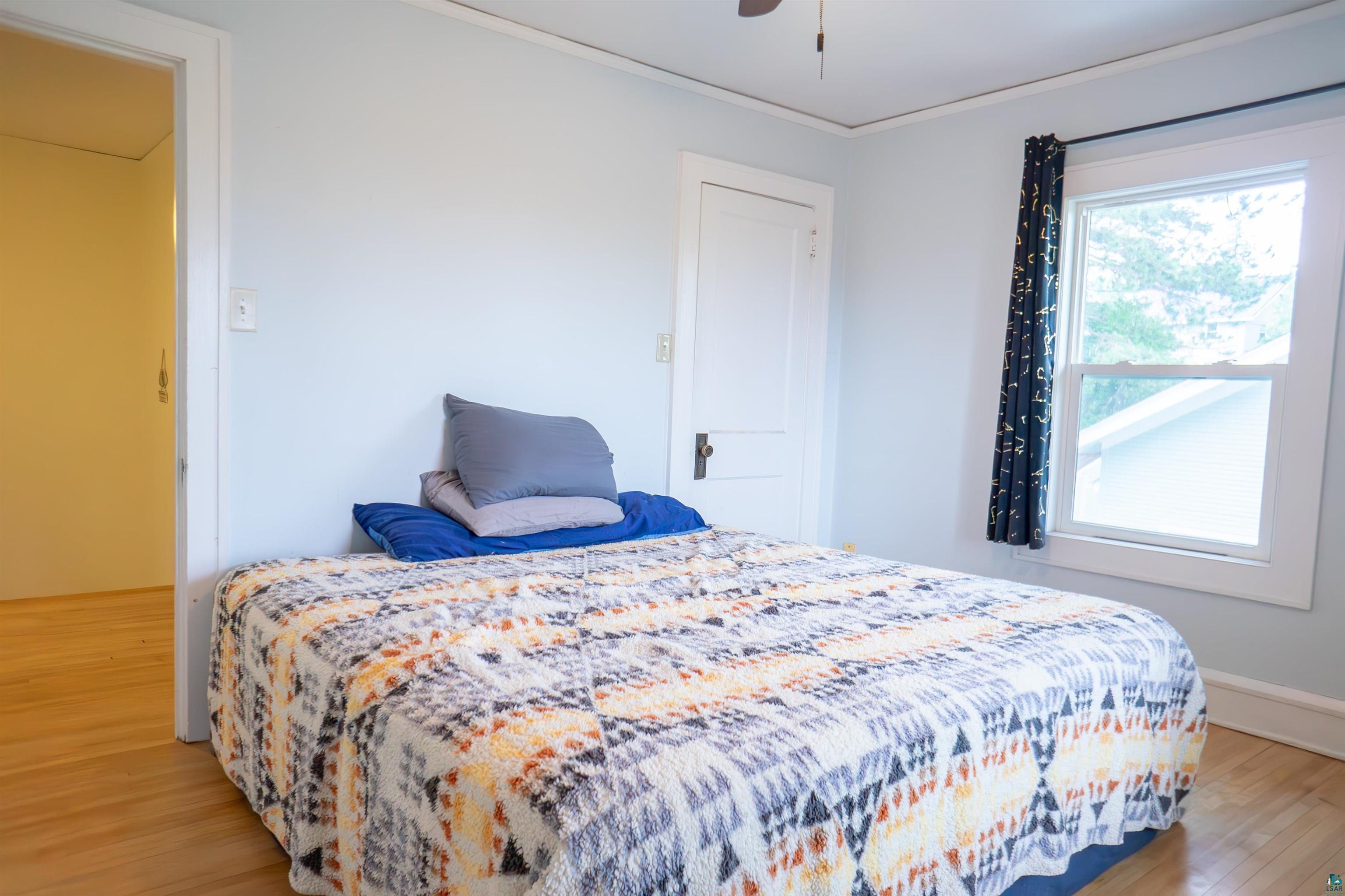 201 Snively Road Duluth, MN 55803 - Photo 14 of 21 Bedroom with ceiling fan and hardwood / wood-style flooring