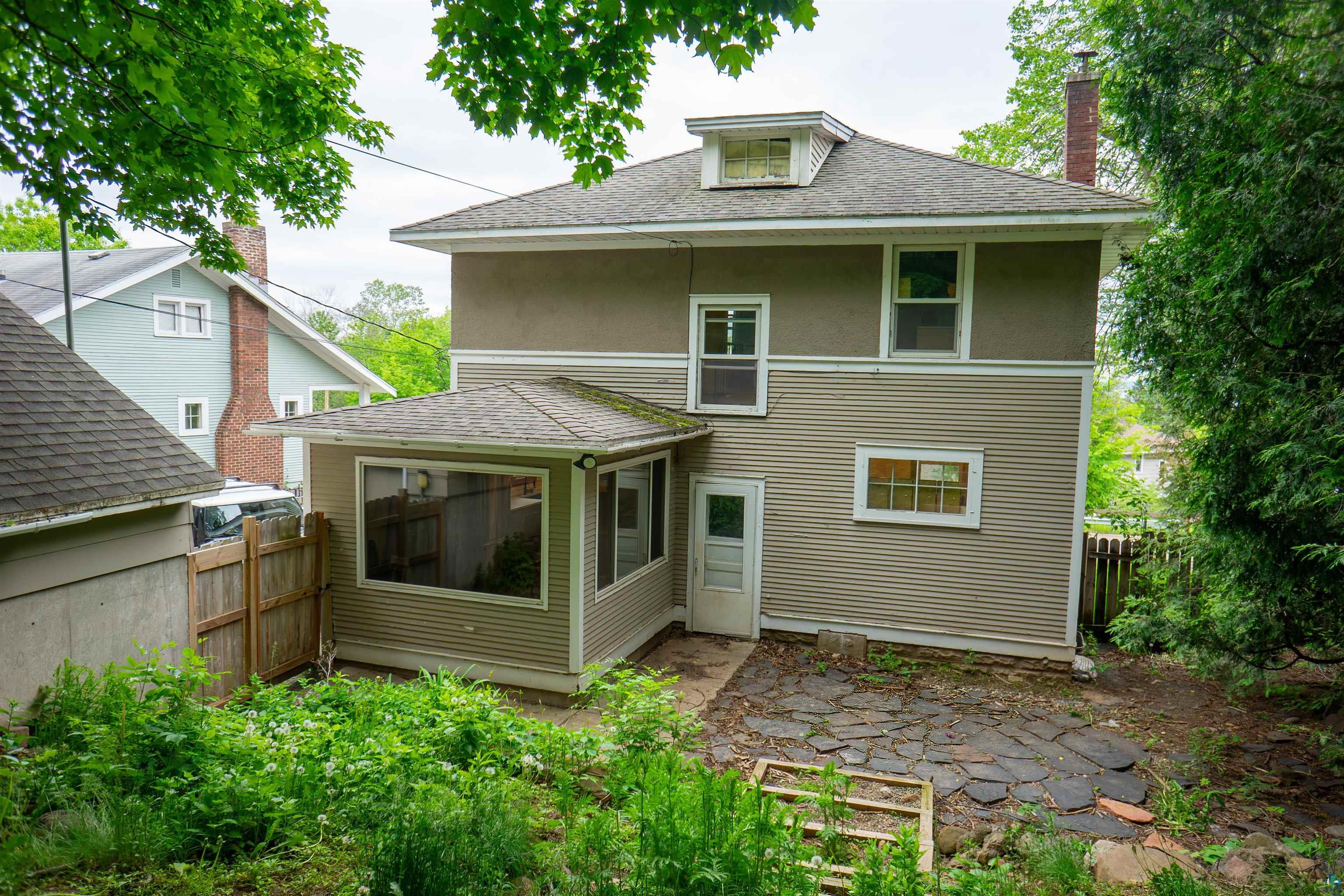 201 Snively Road Duluth, MN 55803 - Photo 18 of 21 Back of house featuring a patio